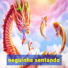 neguinha sentando